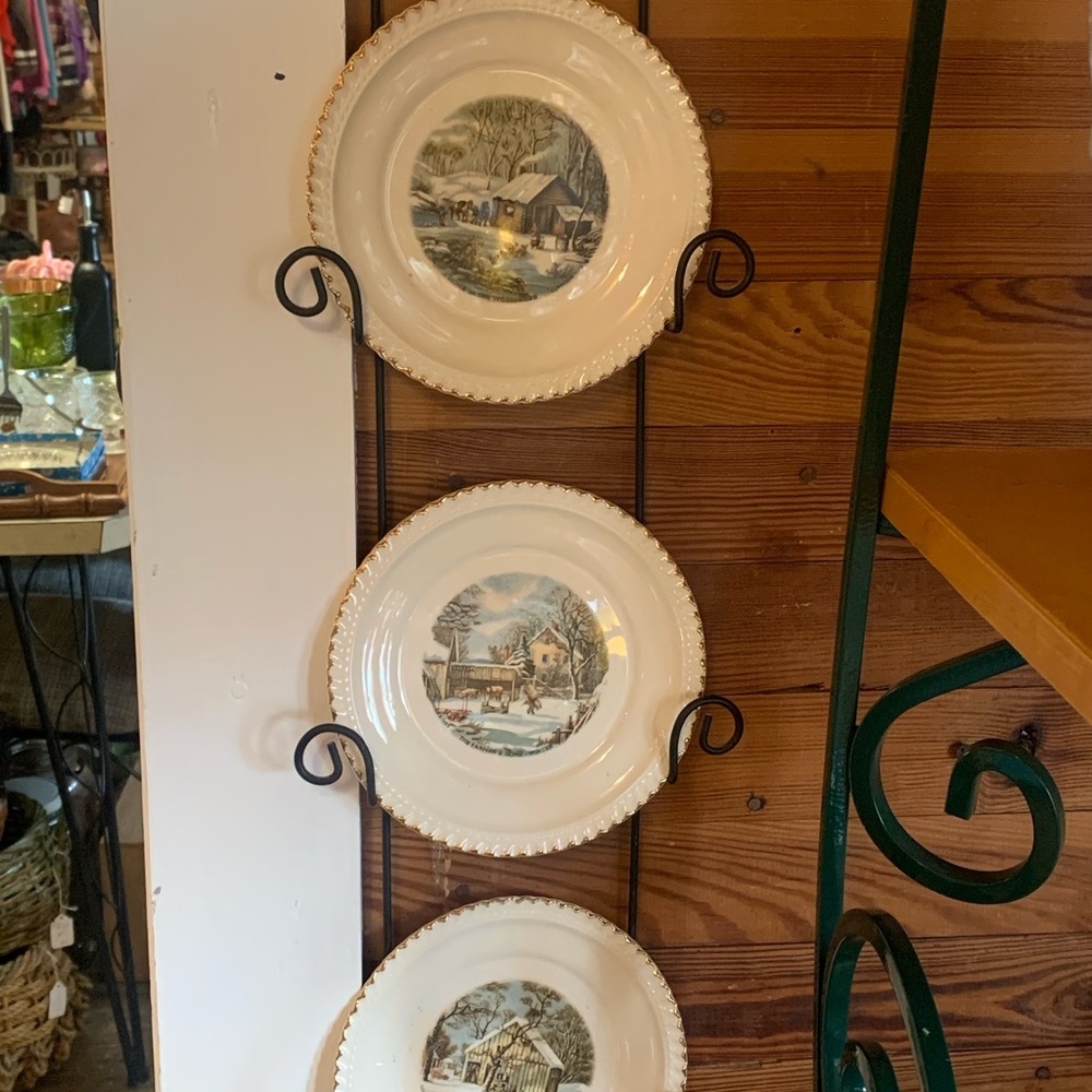 Currier and Ives small saucers and plate rack.